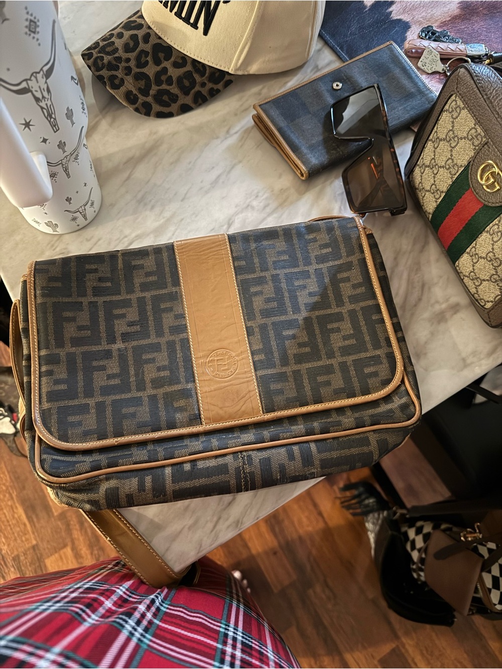 This is a vintage Fendi Zucca Zucchino monogram crossbody handbag.